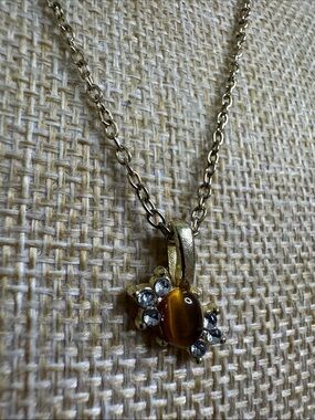 Gold-Tone Brown Cat’s Eye Pendant Necklace with Clear Accent Stones